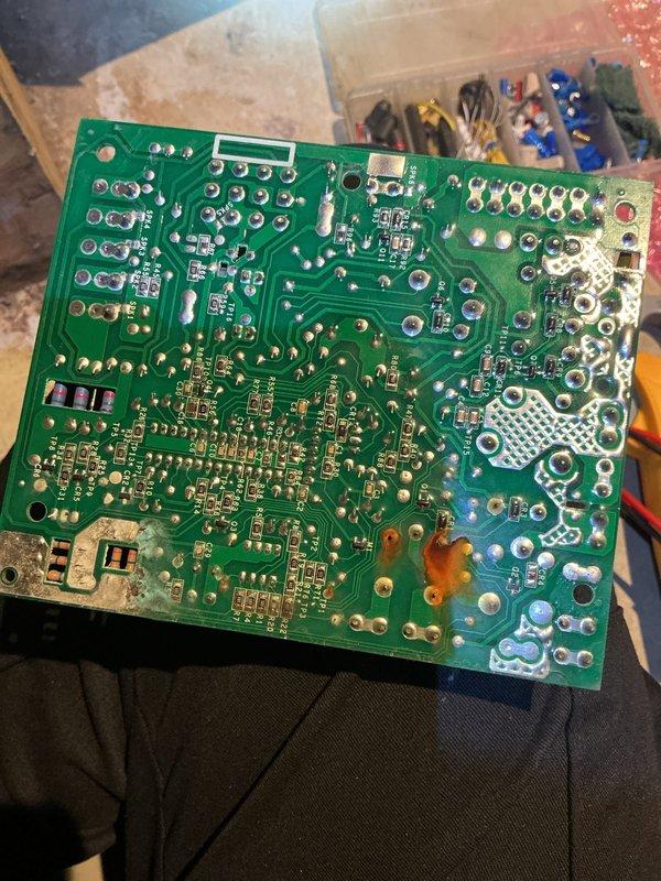 # No Heat Service Call

Responded to a no heat call where the furnace would not turn on. Upon inspection, identified a failed control board as the source of the problem. Removed the defective HVAC control board (part number 150-1841) from the unit and documented the board's condition through photographs showing the component side with relays, capacitors, terminal connections, and solder side. The control board displayed typical failure characteristics requiring replacement to restore heating operation to the system.