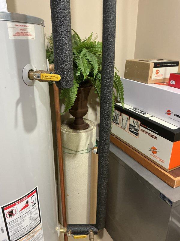 Responded to no hot water complaint on 14-year-old residential water heater. Upon inspection, determined unit had reached end of serviceable life and recommended replacement. Customer approved installation of new water heater. Removed old unit, installed new residential water heater with proper venting and plumbing connections including copper supply lines, pressure relief valve, and code-compliant piping configuration. Tested all connections for leaks, verified proper operation, and confirmed hot water delivery to fixtures throughout home.