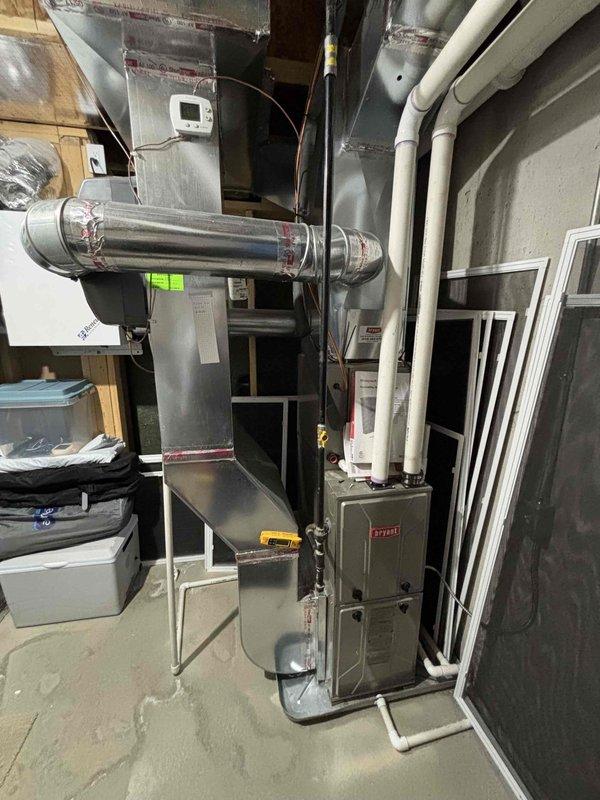 Completed furnace super tune-up on residential HVAC system. Performed comprehensive inspection of furnace unit and connected ductwork in basement utility area, verified proper operation of all components, and inspected exterior condensing unit. All equipment found to be in functional condition with no immediate service needs identified.