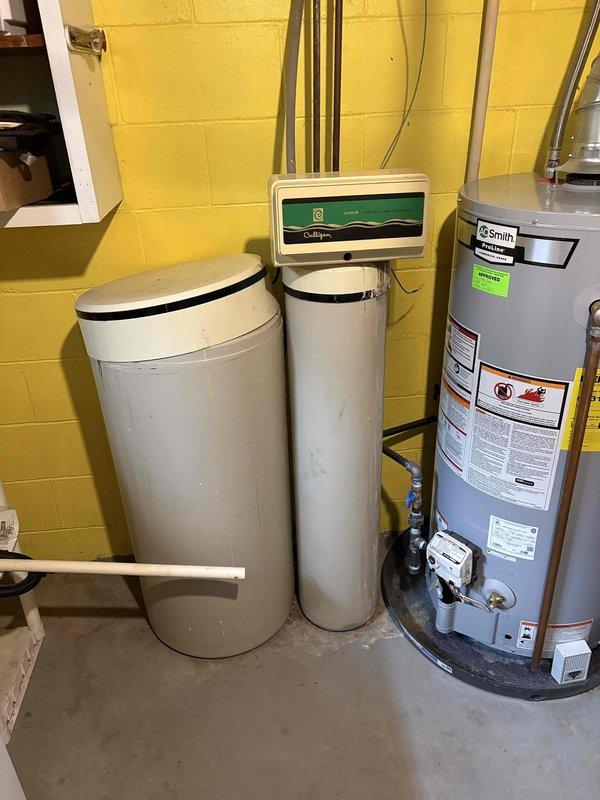 Responded to service call to connect refrigerator water dispenser to existing water supply line. Upon arrival, assessed utility room plumbing configuration including water softener system and main water supply lines. Successfully tapped into cold water supply line and installed appropriate fittings and quarter-turn shut-off valve for refrigerator connection. Ran water line from connection point to refrigerator location, ensuring proper routing and securing to prevent kinks or damage. Tested water dispenser operation, verified no leaks at connection points, and confirmed adequate water pressure and flow to dispenser. Customer advised on shut-off valve location for future maintenance needs.