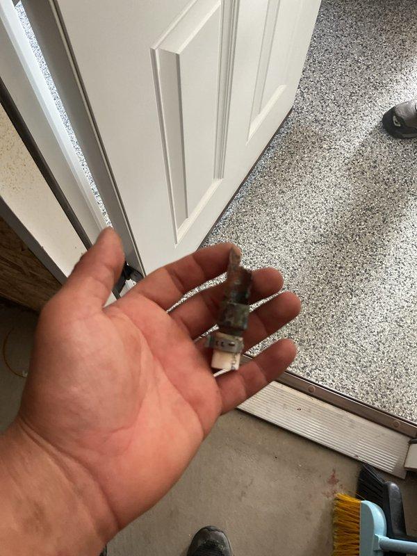 Responded to a tankless water heater condensation drain repair. Upon inspection, identified a failed neutralizer cartridge component that had deteriorated and was causing drainage issues. Removed the defective neutralizer assembly, which showed significant wear and mineral buildup. Cleaned the condensation drain line and surrounding connections to ensure proper flow. Installed replacement neutralizer components and verified proper drainage function. System tested and confirmed operating within normal parameters with condensation draining correctly. Unit left in full working order.