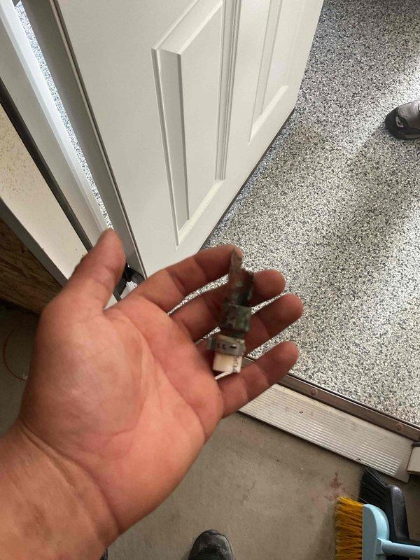 Responded to a tankless water heater condensation drain repair. Upon inspection, identified a failed neutralizer cartridge component that had deteriorated and was causing drainage issues. Removed the defective neutralizer assembly, which showed significant wear and mineral buildup. Cleaned the condensation drain line and surrounding connections to ensure proper flow. Installed replacement neutralizer components and verified proper drainage function. System tested and confirmed operating within normal parameters with condensation draining correctly. Unit left in full working order.