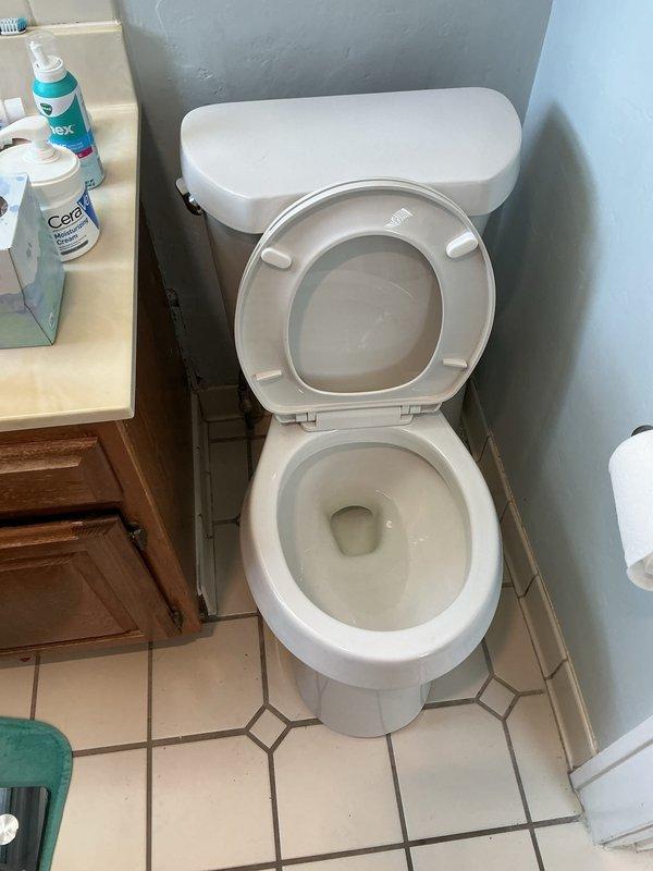 Responded to a toilet leak at the base. Upon inspection, removed and reset the toilet with a new wax ring seal and closet bolts to eliminate the water seepage between the fixture and floor flange. Verified proper seating and tested for leaks upon completion.