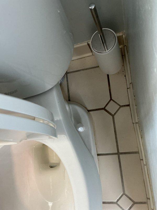 Responded to a toilet leak at the base. Upon inspection, removed and reset the toilet with a new wax ring seal and closet bolts to eliminate the water seepage between the fixture and floor flange. Verified proper seating and tested for leaks upon completion.