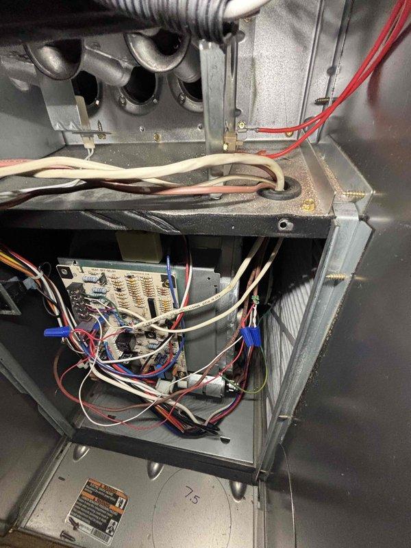 Completed annual heating maintenance on 11-year-old Carrier furnace system with integrated humidifier. Performed comprehensive tune-up including inspection of heat exchanger assembly, burner operation, gas manifold, and all internal components. Verified proper electrical connections throughout control board and wiring harness, checked all safety controls and limit switches. Inspected blower motor assembly and confirmed proper operation. Cleaned burner assembly and interior cabinet surfaces where dust accumulation was present. Tested system operation and verified all components functioning within manufacturer specifications. Unit operating properly upon completion of service.