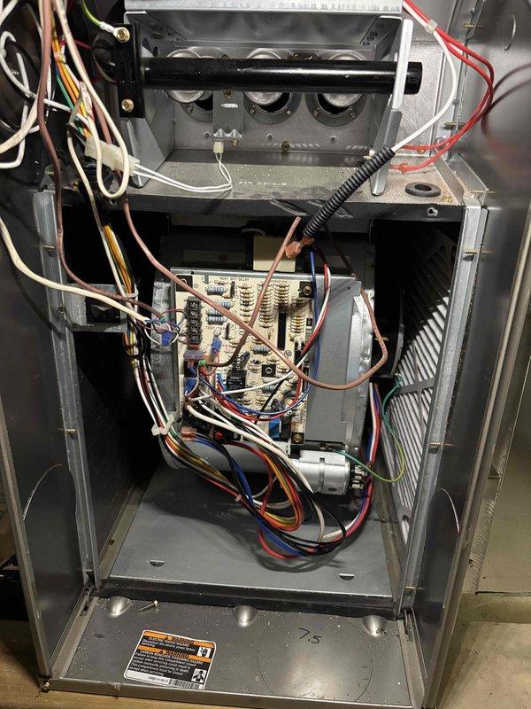 Completed annual heating maintenance on 11-year-old Carrier furnace system with integrated humidifier. Performed comprehensive tune-up including inspection of heat exchanger assembly, burner operation, gas manifold, and all internal components. Verified proper electrical connections throughout control board and wiring harness, checked all safety controls and limit switches. Inspected blower motor assembly and confirmed proper operation. Cleaned burner assembly and interior cabinet surfaces where dust accumulation was present. Tested system operation and verified all components functioning within manufacturer specifications. Unit operating properly upon completion of service.