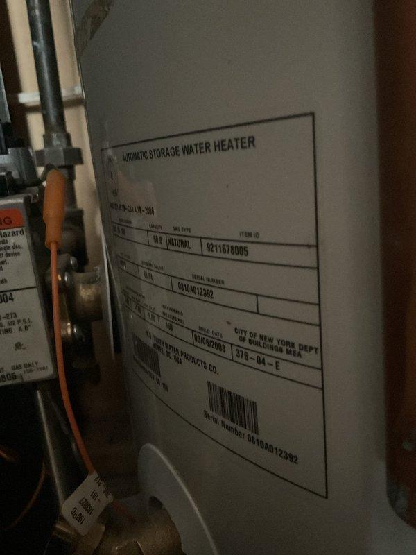 Responded to customer complaint of lukewarm and inconsistent hot water from approximately 15-year-old water heater. Upon arrival, inspected automatic storage water heater installation in utility closet with close proximity to furnace unit. Documented equipment condition and configuration with photographs showing water heater specifications, plumbing connections, and tight clearance spacing between water heater and HVAC system. Assessed potential impact of limited ventilation space on water heater performance given close quarters installation. Evaluated temperature settings, combustion air supply, and venting system operation to identify cause of inadequate and fluctuating water temperature.