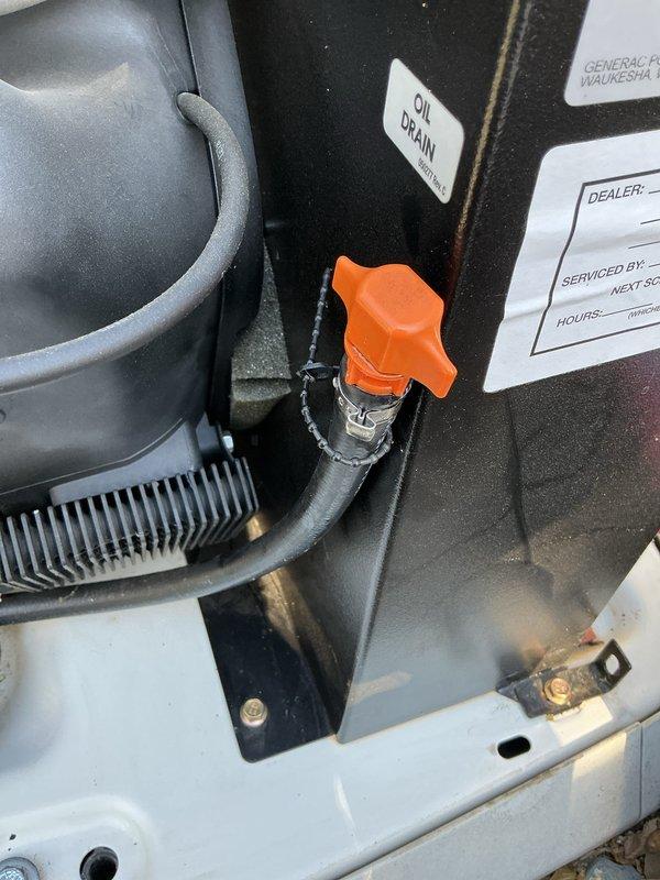 Completed scheduled 5-year maintenance tune-up on Generac generator unit. Performed comprehensive inspection of all mechanical components including valve assembly, motor housing, piping connections, and exhaust system. Verified oil drain valve operation and documented equipment condition with service labels updated. All components found to be in normal operating condition with appropriate wear patterns for equipment age. Generator tested and confirmed operational within manufacturer specifications.