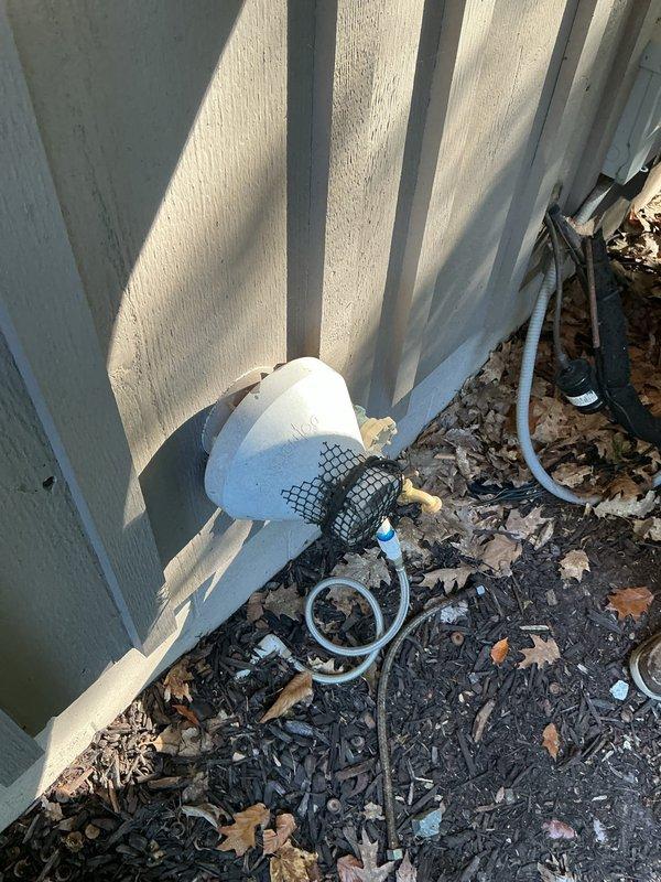 Responded to report of critters nesting inside EnergiAir ARVT961005CN furnace installed approximately one year ago. Upon arrival, confirmed furnace remained operational despite intrusion. Coordinated with handyman already on-site performing nest removal and debris cleanup from interior compartment. Inspected outdoor intake/exhaust termination and identified inadequate screening on PVC termination assembly allowing wildlife access. Removed existing insufficient mesh guard and installed heavy-duty rodent-proof screening over intake termination point mounted on exterior wall. Verified all combustion air pathways clear of obstructions and nesting materials. Opened furnace cabinet and inspected internal components including blower assembly, gas valve, heat exchanger, and control board for damage from wildlife activity. Confirmed no damage to wiring harnesses, insulation, or mechanical components. Checked burner assembly ports for blockages. Cycled unit through complete heating operation to 