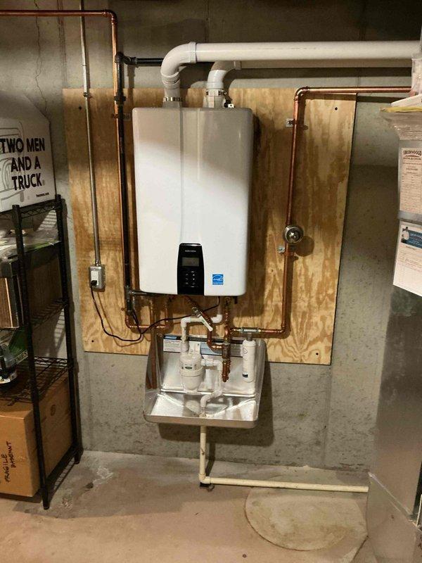 Completed comprehensive tankless water heater tune-up service on a Navien unit scheduled for preventive maintenance prior to warranty expiration in November 2026. Performed standard maintenance protocol including descaling flush, inlet filter cleaning, igniter inspection, and verification of all operational parameters. Unit tested and confirmed functioning properly with all components within manufacturer specifications.