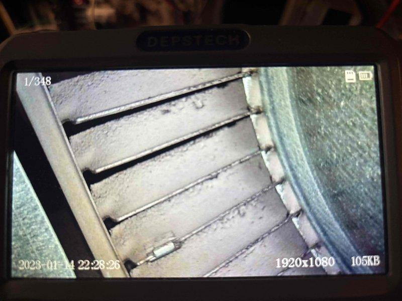 Performed annual heating inspection on the 19-year-old Carrier furnace, including borescope examination of the blower assembly, which revealed moderate dust and debris accumulation on the squirrel-cage blades and housing. Recommended blower wheel cleaning to maintain proper airflow, efficiency, and system longevity. No humidifier is installed on the system.