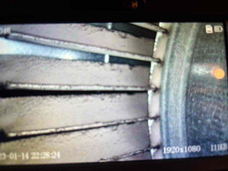 Performed annual heating inspection on the 19-year-old Carrier furnace, including borescope examination of the blower assembly, which revealed moderate dust and debris accumulation on the squirrel-cage blades and housing. Recommended blower wheel cleaning to maintain proper airflow, efficiency, and system longevity. No humidifier is installed on the system.