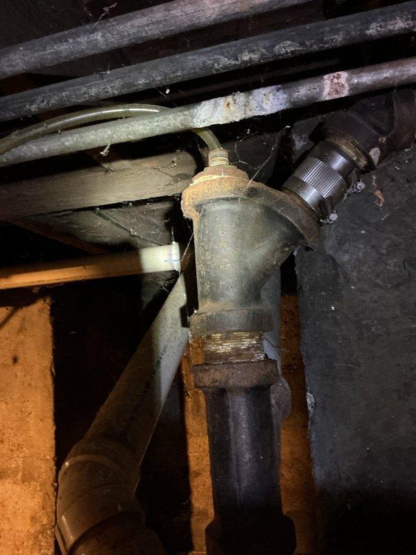 Replaced the condensate pump discharge line as a no-charge service item. Routed and secured the new line to the drain point and verified proper flow and drainage. Noted heavy corrosion on nearby cast iron drain fittings and utility sink plumbing during the visit, which may warrant future inspection.