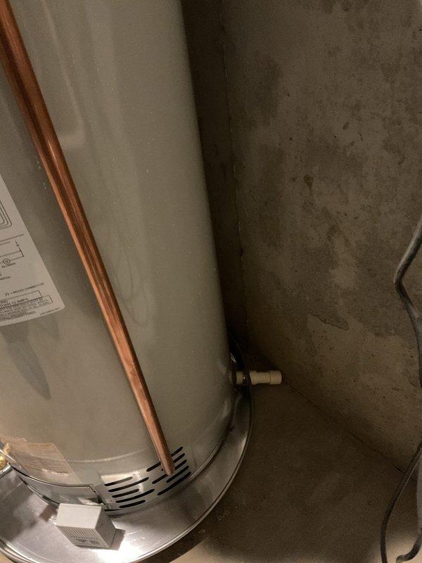 Installed a new 50-gallon LP power vent water heater, completing the water, gas, and venting connections and placing the unit in a drain pan with a leak sensor. Routed and secured the PVC vent/intake piping and condensate drain to the exterior, then verified proper operation and leak-free connections.