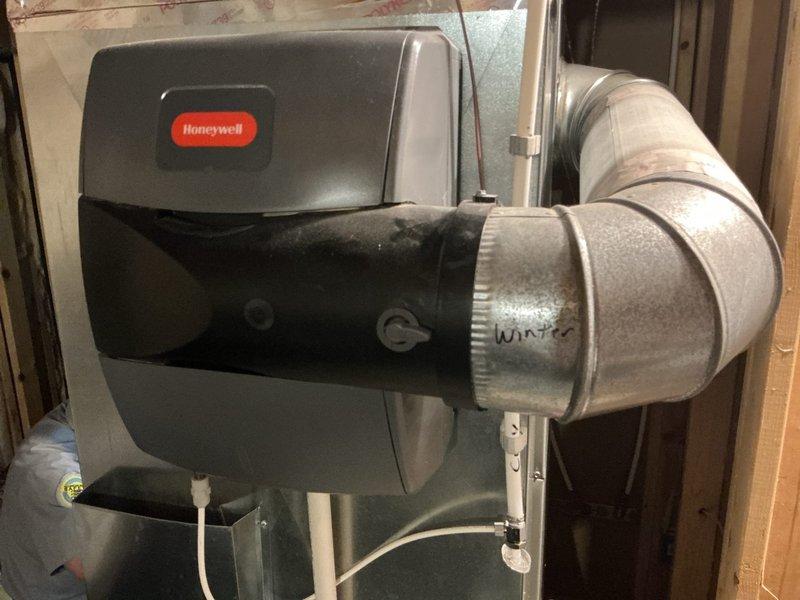 Performed a comprehensive furnace tune-up on a 9-year-old unit, including inspection of the combustion and airflow components and verification of proper operation of the digital thermostat controls and wiring connections. Inspected the whole-home Honeywell humidifier, including the water supply and drain lines, damper setting, and ducting, and confirmed the unit is properly set for winter operation with no leaks, rust, or damage observed. System was found to be in good working condition and operating as intended.