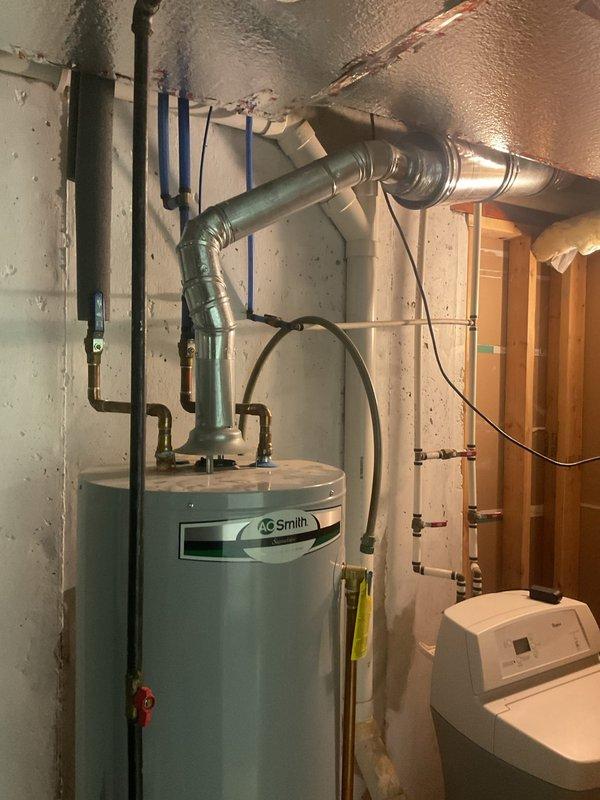 Performed annual maintenance and tune-up on the 19-year-old Lennox furnace, including inspection of heat exchanger, burners, ignition system, flue/venting, and safety controls to verify safe, efficient operation. Visually inspected adjacent gas-fired water heater, galvanized flue connection, and gas line, finding no evidence of leaks, heavy corrosion, or flue deterioration. No humidifier is installed on the system, and equipment was left operating normally at completion.