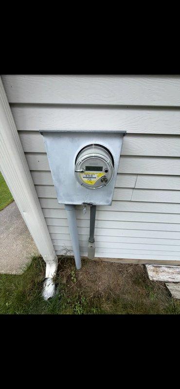 Installed a generator inlet plug at the exterior of the residence, connecting it to the existing electrical service via the main breaker panel and meter enclosure. Verified proper breaker configuration and secure conduit and wiring terminations, and confirmed the installation was complete and operational.