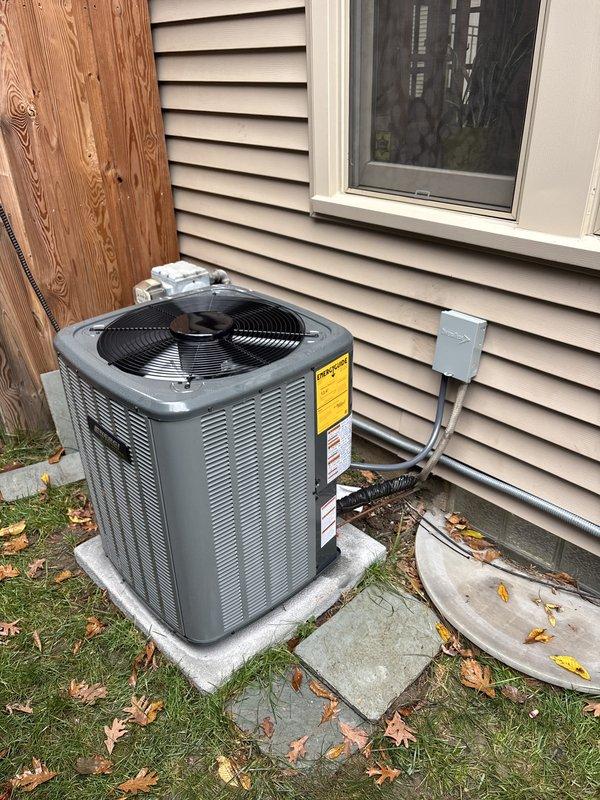 Completed full system replacement, installing a new gas furnace and matching air conditioning condenser. The outdoor condenser was set on a level concrete pad and connected to the line set, electrical disconnect, and flexible conduit. The installation was finished with the equipment secured and the surrounding area left clean and free of visible damage.
