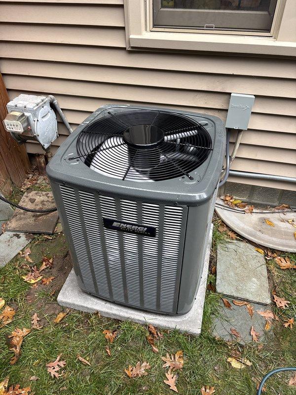 Completed full system replacement, installing a new gas furnace and matching air conditioning condenser. The outdoor condenser was set on a level concrete pad and connected to the line set, electrical disconnect, and flexible conduit. The installation was finished with the equipment secured and the surrounding area left clean and free of visible damage.