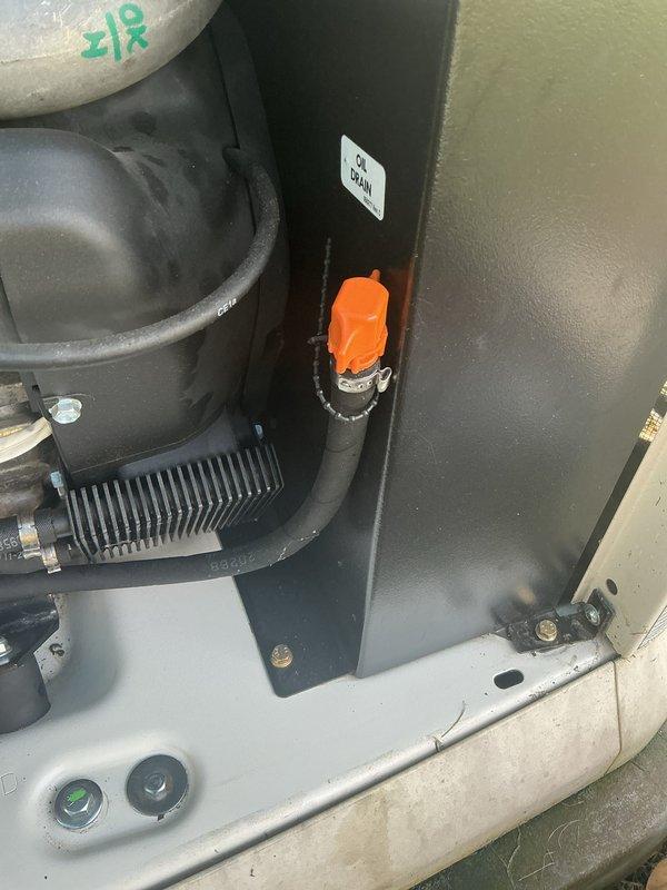 Performed annual preventive maintenance and tune-up on a Generac 22kW standby generator. Inspected the engine compartment, hoses, clamps, oil drain assembly, and enclosure interior, finding all components clean and intact with no signs of rust, leaks, frost, or damage. Unit was left in good working condition with no issues identified.