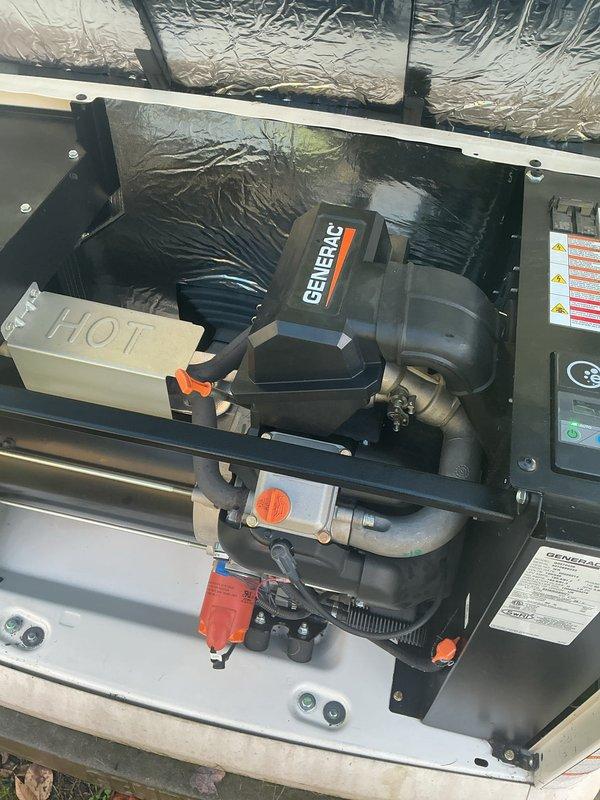 Performed annual preventive maintenance and tune-up on a Generac 22kW standby generator. Inspected the engine compartment, hoses, clamps, oil drain assembly, and enclosure interior, finding all components clean and intact with no signs of rust, leaks, frost, or damage. Unit was left in good working condition with no issues identified.