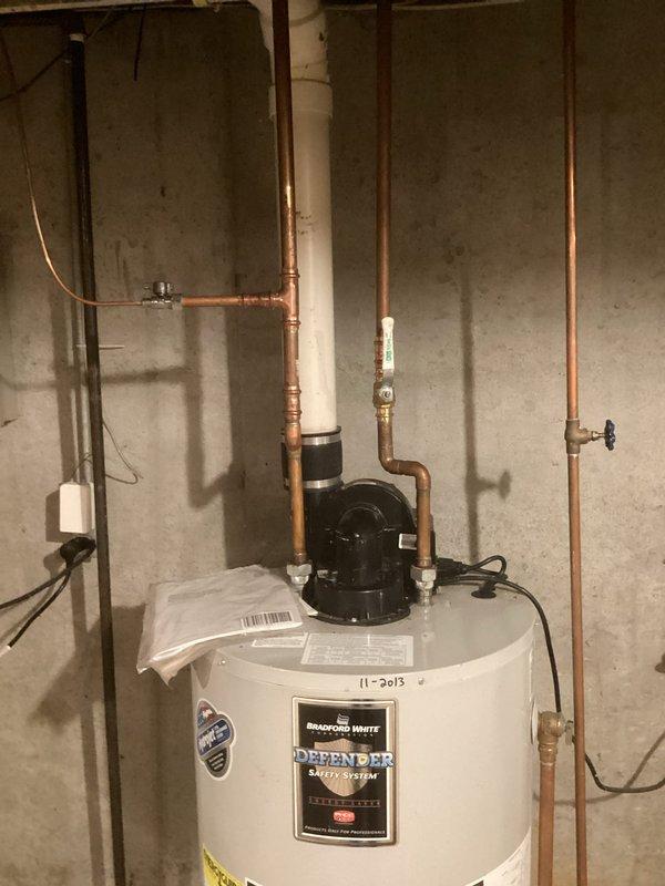 Performed annual heating tune-ups on three furnaces (Ruud, ENE, and a Sears wall furnace) and the associated humidifier, inspecting and servicing components for safe, efficient operation. Visually inspected the power-vent water heater, vent piping, and adjacent copper supply lines and shutoff valves, and found no evidence of leaks, corrosion, or damage.