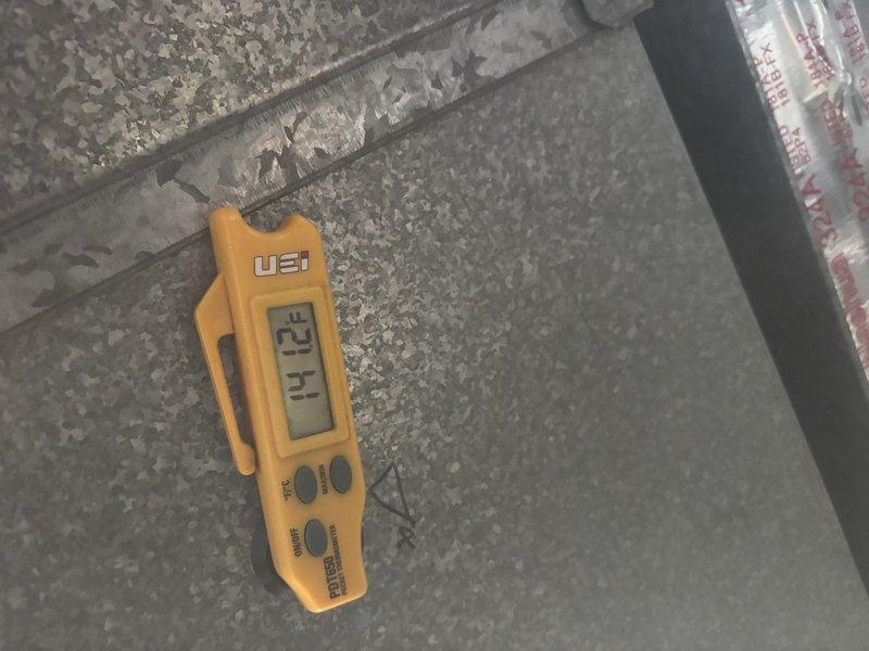 Responded to a no-heat call and inspected the furnace/air handler cabinet, including condensate drain piping, wiring, and supply ductwork. Verified supply plenum temperature of approximately 141°F using a digital thermometer, confirming the unit was producing heat, and checked plenum seams and foil-tape connections for leaks or deterioration with none found. Unit was operating within normal temperature range upon completion.