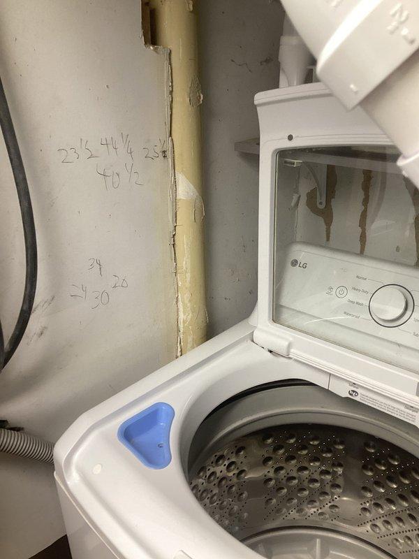 Responded to a recurring main drain backup, accessing the system through the bathroom floor cleanout and the laundry area drain connections. Inspected the washing machine standpipe and drain hose connections and the bathroom fixtures for signs of overflow and residue, then cleared the blockage in the main drain line to restore proper flow. Verified normal drainage from the fixtures and washer discharge following the clearing.