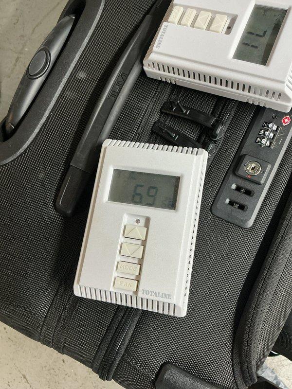 Diagnosed continuous heat call in a multi-zone system following a recent AC installation. Inspected the Totaline thermostats and zone control panel wiring (Zones 1 and 3), and found debris accumulation on the panel and wiring terminations at the control board entry points. Cleaned the zone panel and verified thermostat and zone control wiring integrity, then tested the heating cycle to confirm each zone now shuts off properly at setpoint.
