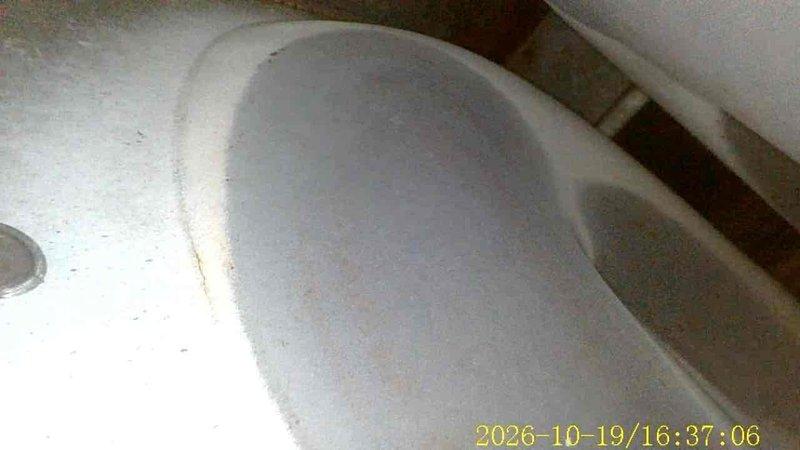 Performed a complete furnace super tune-up on an approximately 15-year-old unit, including inspection of the heat exchanger, burner assembly, and cabinet interior, and cleaning of components to restore proper operation and efficiency. Documented rust staining, surface corrosion, and a hairline crack near a cabinet seam, along with discoloration in the condensate/drain basin area, for monitoring given the age of the equipment.