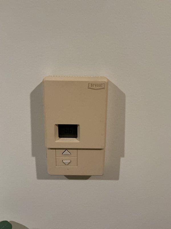Performed a Furnace Super Tune-up on a 15-year-old furnace as part of routine seasonal maintenance, including inspection of the system's controls and operation. Verified operation of the Bryant thermostat and the Zone Perfect two-zone control panel, noting low-voltage wiring hanging loosely beneath the panel and cracking and discoloration of the panel cover, and recommended securing the wiring and monitoring the panel for future replacement.