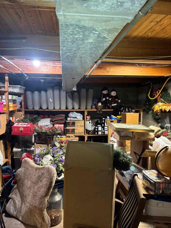 Responded to a basement drain backup causing water intrusion by accessing the floor drain and cleanout fitting at the base of the vertical PVC drain stack. Cleared the blockage from the drain line using drain cleaning equipment, restored proper flow, and verified the line drained freely without backing up.