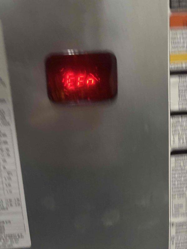 Responded to a no-heat call on a Carrier furnace installed approximately one year ago and inspected the unit's integrated control board and status display. The board's seven-segment LED displayed a fault code, and the low-voltage terminal connections (24VAC, W, Y, G, C, DHUM) and wiring were visually inspected with no evidence of burn marks, corrosion, or damage. Documented the fault code and board condition, and reviewed the unit's data label to verify the age and installation date for the warranty coverage determination.