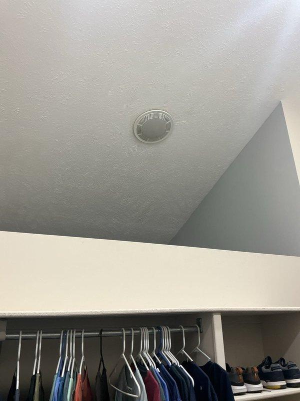 Replaced the bathroom exhaust fans, installing new ceiling-mounted fan units with integrated light lenses and securing the grilles flush to the textured ceiling. Verified proper operation and airflow at each unit, and confirmed the surrounding ceiling surfaces and fixtures were left clean and undamaged.