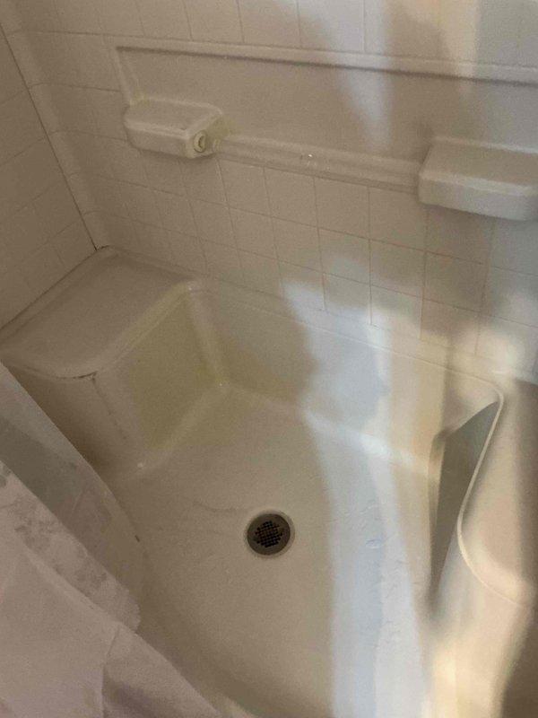 Responded to a slow-draining shower with gurgling at the toilet, indicating a partial obstruction in the main drain line shared by both fixtures. Cleared the blockage using drain cleaning equipment and restored full flow, then verified proper drainage at the shower and confirmed the toilet no longer gurgled during operation.
