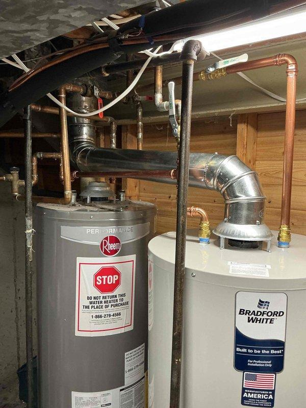 Installed a new 40-gallon tall natural gas water heater with a 6-year warranty and connected it to the existing galvanized vent, gas supply, and copper domestic water lines. Verified proper draft hood and flue connection, checked all gas and water fittings for leaks, and confirmed safe operation with no visible leaks or damage.