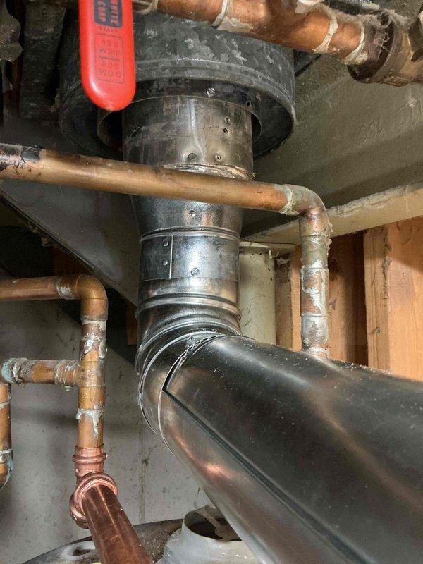 Installed a new 40-gallon tall natural gas water heater with a 6-year warranty and connected it to the existing galvanized vent, gas supply, and copper domestic water lines. Verified proper draft hood and flue connection, checked all gas and water fittings for leaks, and confirmed safe operation with no visible leaks or damage.