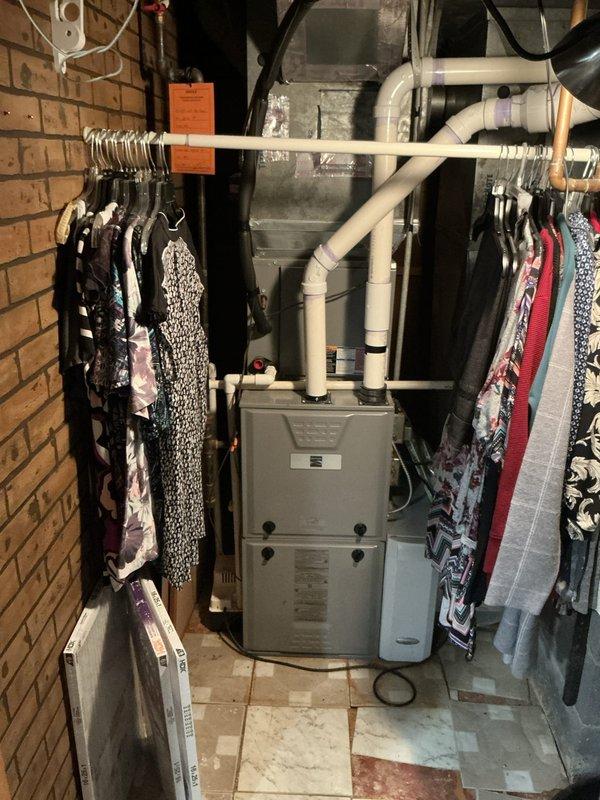 Performed a diagnostic evaluation of a gas furnace with a no-heat complaint and found the unit shut down due to a failed heat exchanger. Documented the equipment condition and installation with photos, and presented a heat exchanger replacement estimate to restore heating operation.