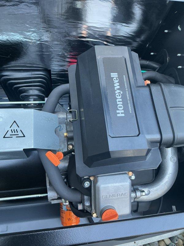 Performed scheduled annual maintenance on a Honeywell standby generator powered by a Generac G-Force engine. Inspected the engine compartment, including the oil filter, air filter housing, intake and exhaust components, hoses, wiring, and enclosure insulation, and found all components clean and in good condition with no signs of rust, leaks, or damage. The unit was verified to be in proper working order following the tune-up.