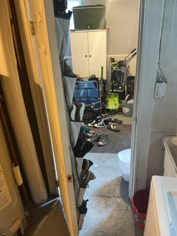 Responded to a follow-up complaint on a 20-year-old atmospheric tank water heater with a burner that would not stay lit following recent furnace replacement. Inspected the unit, including the gas supply and shutoff valve, draft hood, and flue venting connection, to evaluate pilot and burner operation and potential venting or draft issues related to the new furnace installation.