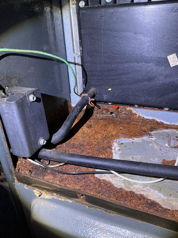 Completed annual heating inspection on the furnace system with humidifier. Inspected the equipment cabinet and found heavy rust and corrosion on the cabinet floor and base, along with surface grime on the cabinet walls; control board, junction box, and wiring connections appeared secure. Performed borescope inspection of the internal ductwork and heat exchanger area, which revealed rust-colored discoloration and light corrosion along the seam edges; recommend continued monitoring of the corroded areas.