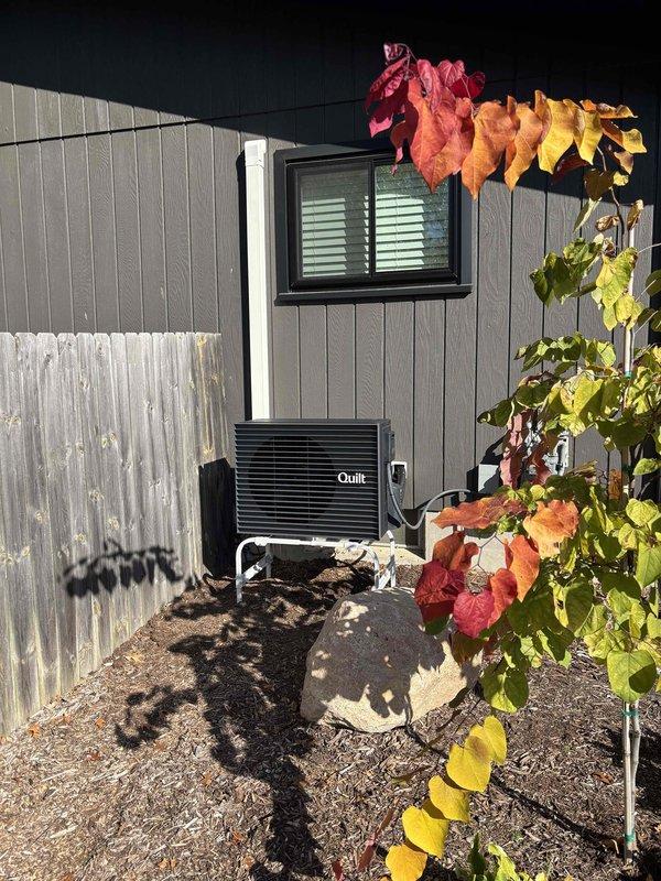Completed installation of a new boiler system, including mounting, piping, and electrical connections per manufacturer specifications. Installed and secured the exterior Quilt heat pump unit on a stand with a weatherproof electrical disconnect, conduit, and condensate drain line routed to the building envelope, and verified the unit shows no visible damage or corrosion.