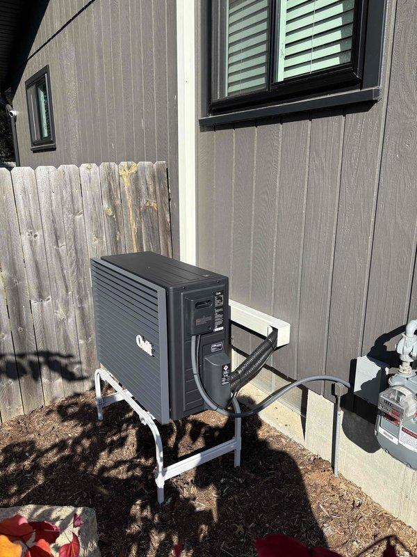 Completed installation of a new boiler system, including mounting, piping, and electrical connections per manufacturer specifications. Installed and secured the exterior Quilt heat pump unit on a stand with a weatherproof electrical disconnect, conduit, and condensate drain line routed to the building envelope, and verified the unit shows no visible damage or corrosion.