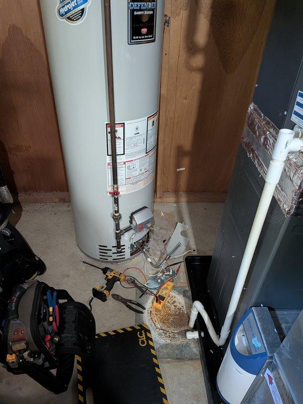 Responded to a gas water heater with no hot water and found the pilot had gone out. Inspected the gas control valve assembly and thermocouple wiring with a multimeter, checked associated wiring for damage, and performed a relight following manufacturer procedures. Verified proper pilot and burner operation and confirmed the unit was heating normally.