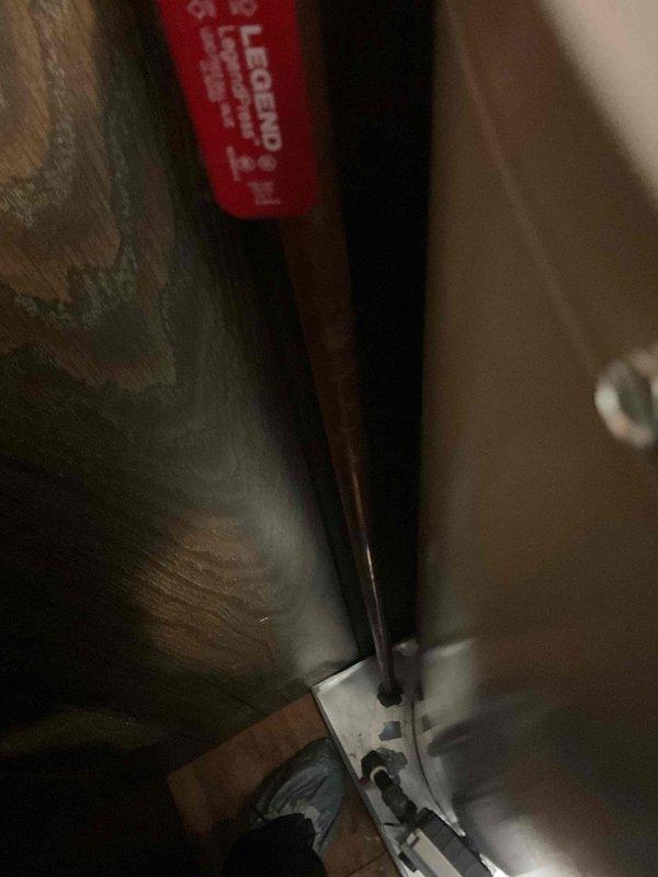 Installed dielectric unions on the water heater's inlet and outlet connections and replaced the anode rod to protect the tank from corrosion. New copper supply piping with brass fittings was run to the top of the tank, and the connections were left clean and properly secured.