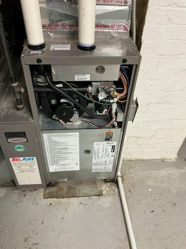 Replaced the failed draft inducer motor on the gas furnace per the approved quote. Removed the upper access panel, disconnected the wiring and pressure tubing, and installed the new inducer assembly. Reconnected the electrical and vent connections, then verified proper ignition sequence and draft operation, with the exterior PVC vent termination inspected and free of obstruction.