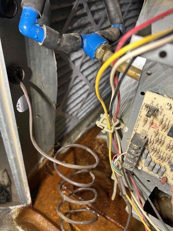 Performed a furnace super tune-up, including inspection of the cabinet, control board, wiring, condensate drain assembly, and air filter. A carbon monoxide reading of 1324 PPM was recorded at the unit, indicating a serious combustion or venting problem, and significant corrosion and moisture were found in the lower cabinet pan near the coil. Because of the elevated CO level and corrosion, the furnace should not be operated until a combustion analysis, heat exchanger and flue inspection, and repair of the water intrusion source are completed.