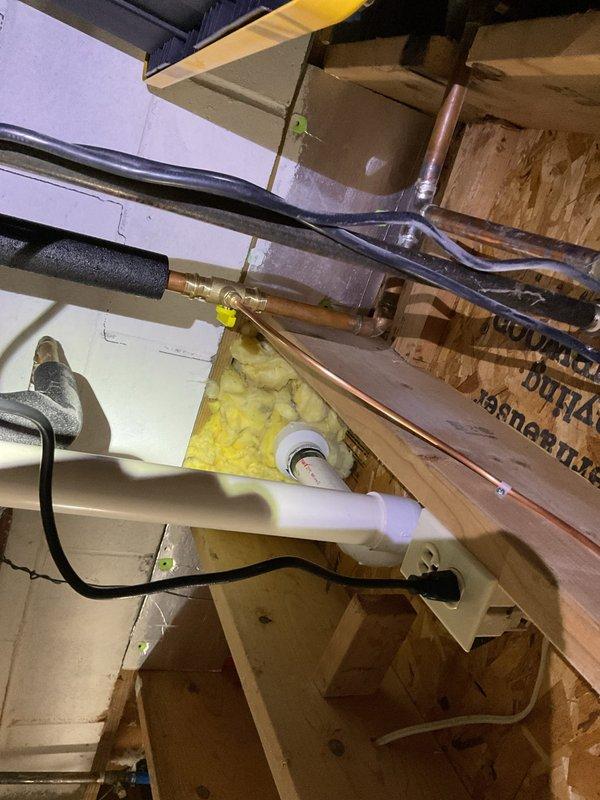 Replaced the failed humidifier solenoid on the Bryant whole-house humidifier and installed a new water supply valve with fresh copper tubing connections. Verified proper water feed to the unit and checked wiring connections to the humidistat control for correct operation.