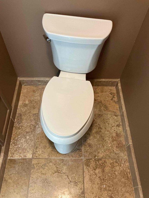 Diagnosed and repaired two toilets: addressed the high-pitched noise and associated odor on one unit by servicing the fill valve and tank components, and replaced the broken flush lever on the second unit, then tested both for proper flushing, refill, and leak-free operation. Also replaced the exterior hose bibb (spigot) with the customer-supplied PROFLO unit, ensuring a secure connection to the supply line and verifying proper shutoff and operation.