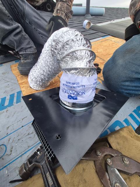 Fixed a leaking shower fan for a family in Clive, Iowa – super common winter condensation issue. Removed the old roof vent, relocated it six feet over to align straight above the pan, re-flashed, re-insulated, re-shingled. Clive roof leak repair. Clive bathroom exhaust venting. Clive shower fan fix.